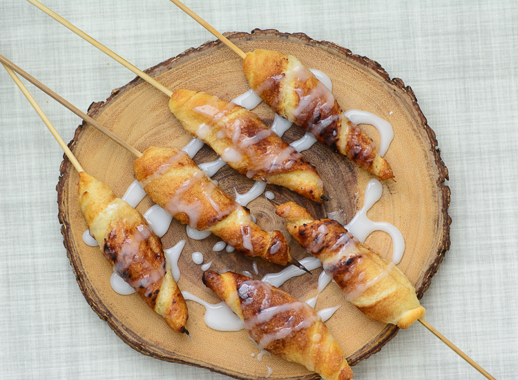 A photo of campfire cinnamon roll-ups, one of the best fall campfire snacks