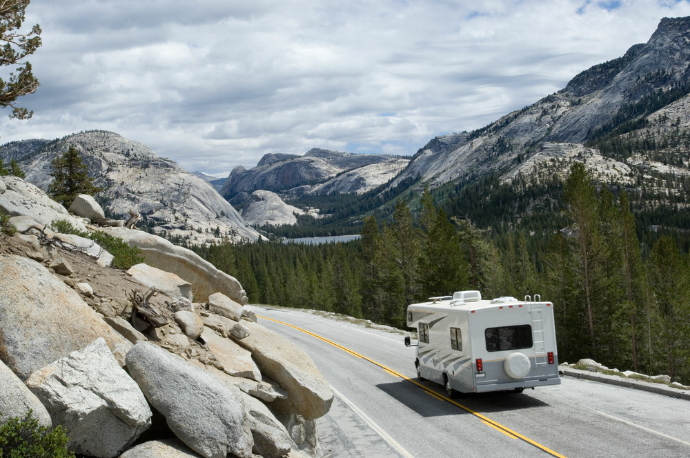 RV traveling on the road in yosemite