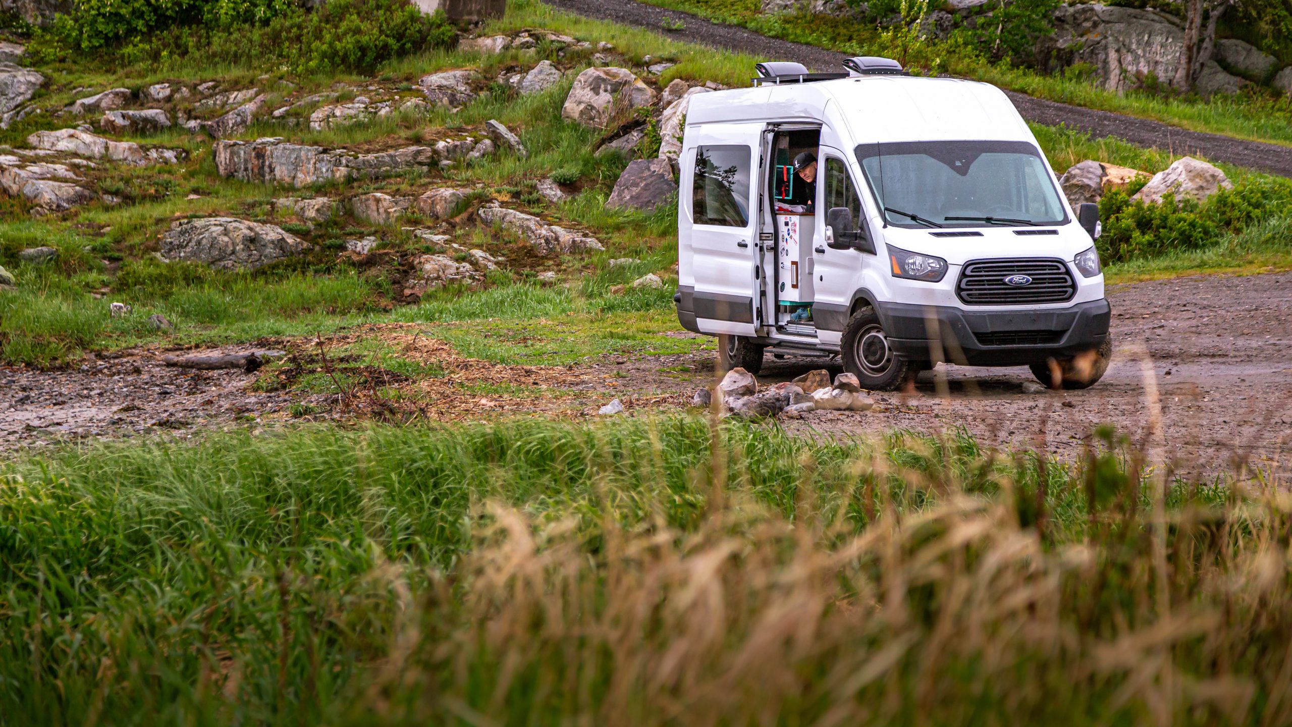 best Class B campervans - camper van parked by mountains