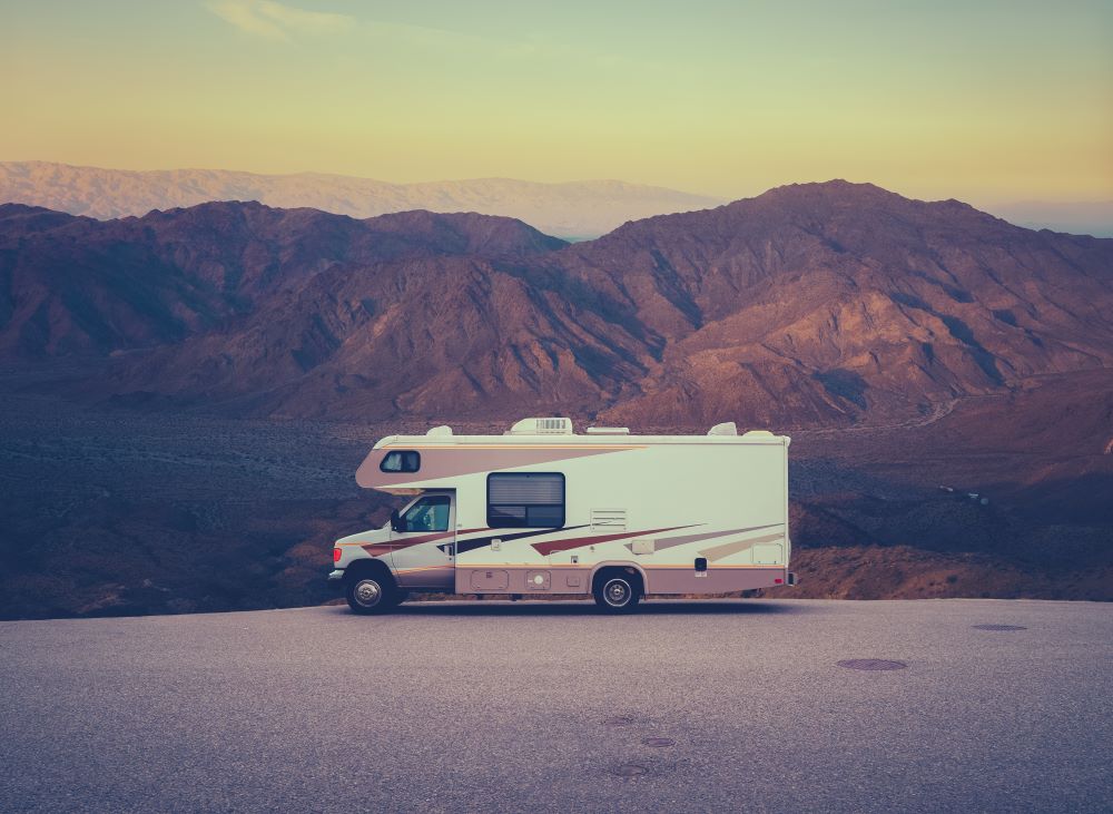 Summer Road Trip Ideas for RVers Retro RV Camper In The Desert