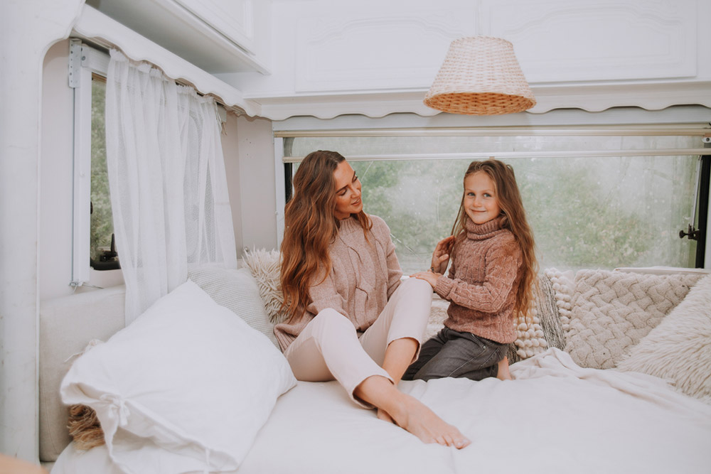 Mom and daughter in an RV Bedroom