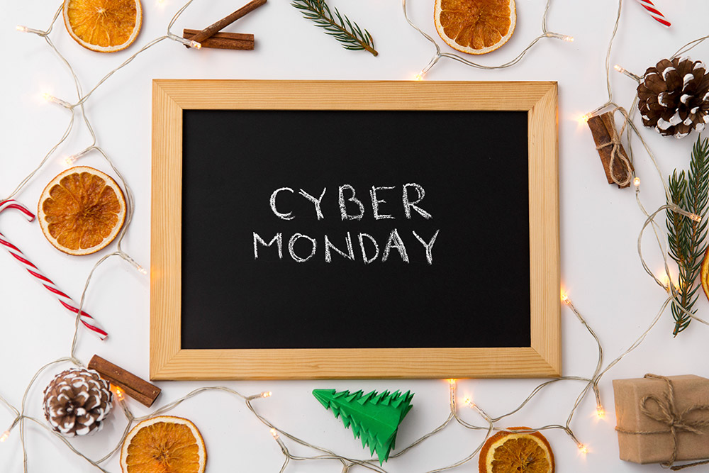 A chalkboard with Christmas decorations to represent Cyber Monday RV Deals