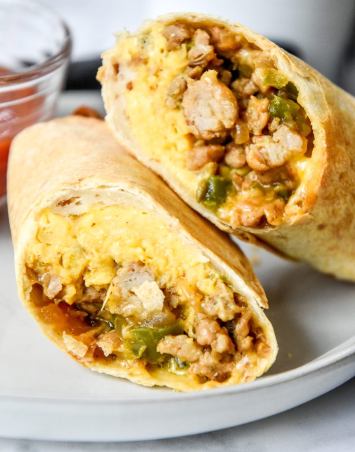Cooked breakfast burritos made from a camping meal prep recipe.