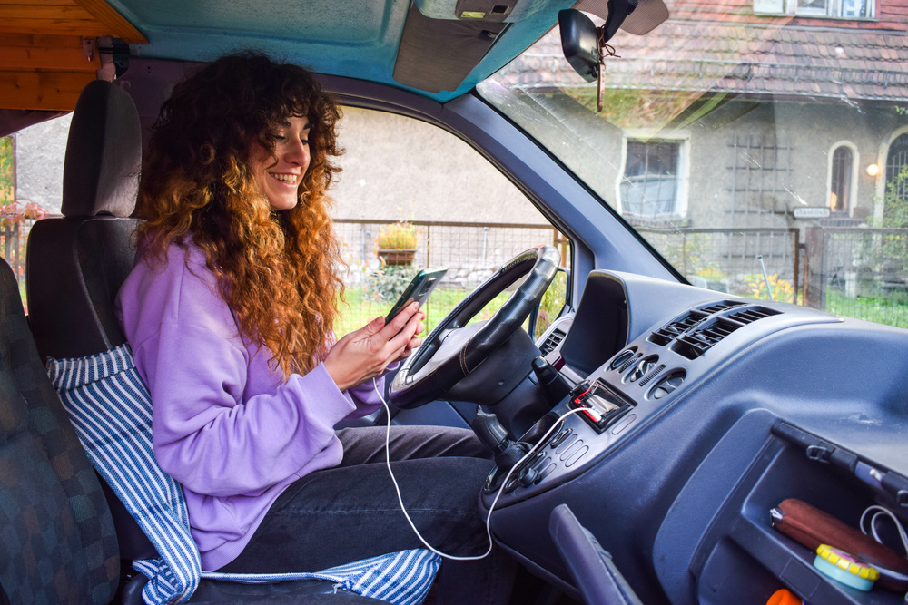 Woman using the best RV GPS Apps