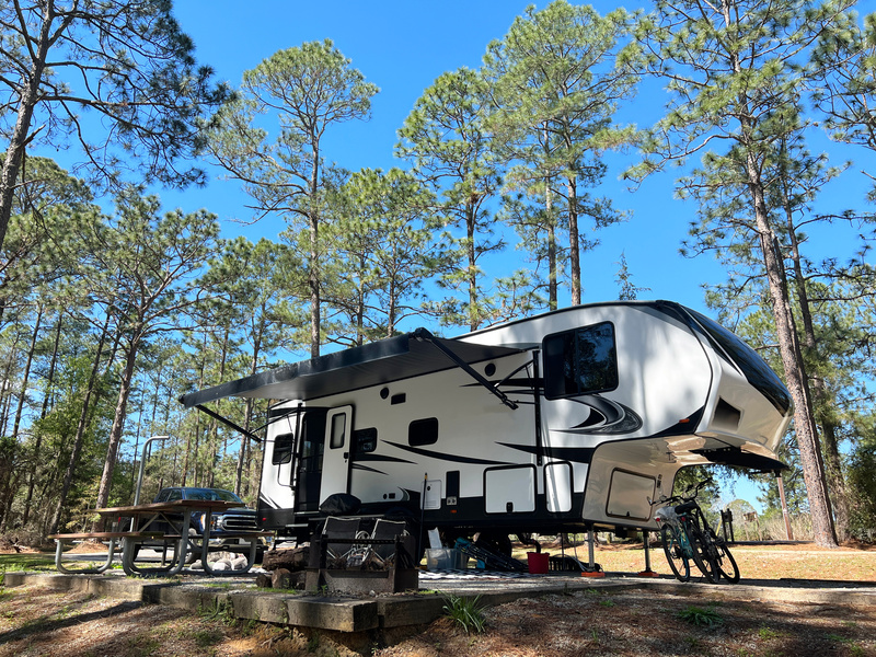 Fifth Wheel at Campsite A new fifth wheel set up at a campsite.