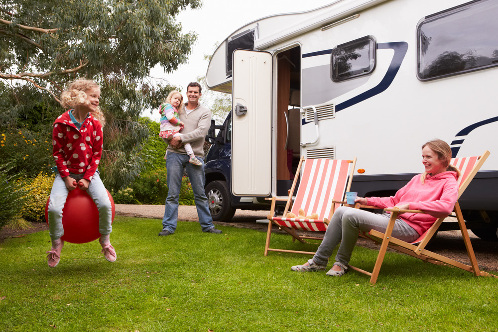 family with boondocking camper