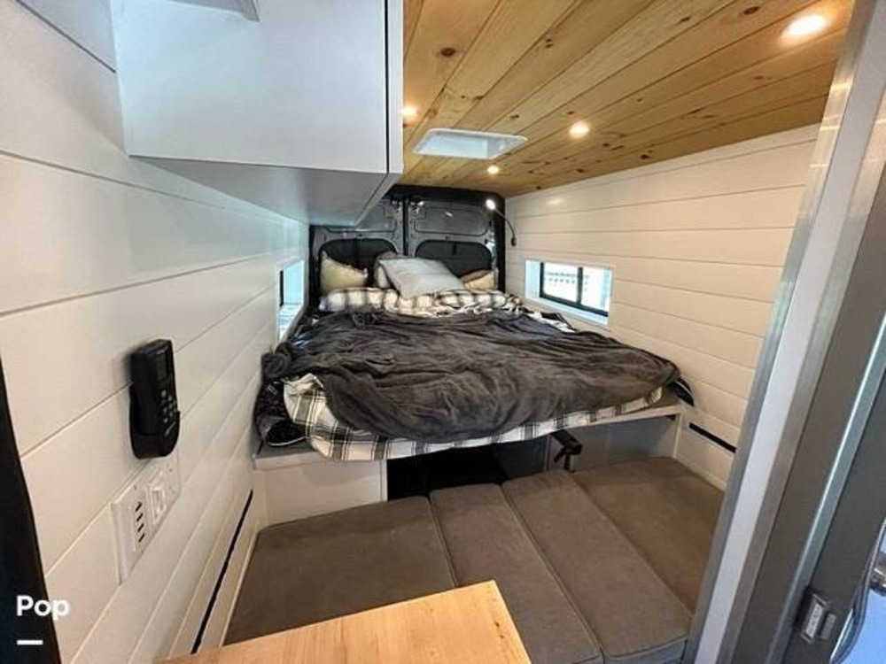 interior of 2023 Ford Transit with additional loft bed