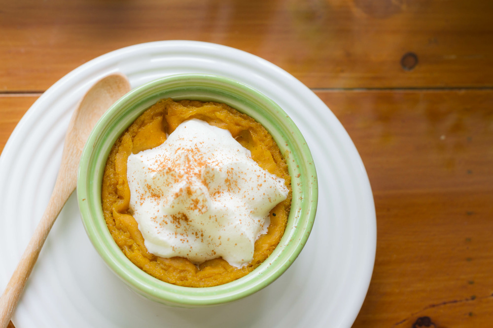 Pumpkin pie pudding topped with whipped cream