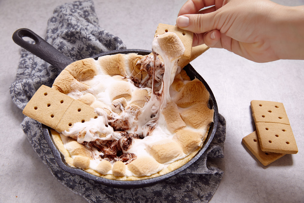 smores dip baked in a cast iron skillet