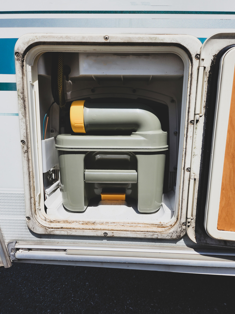Toilet cassette inside a camper van black water toilet cassette inside a camper van