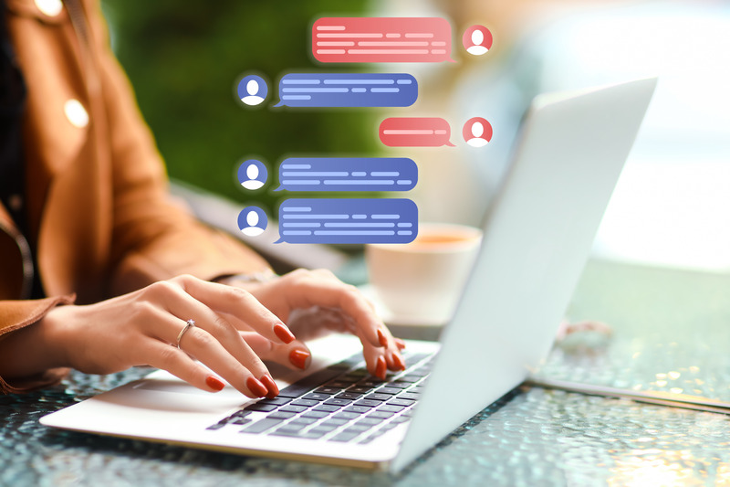 A woman selling her RV online chats with a potential buyer through instant messaging. 