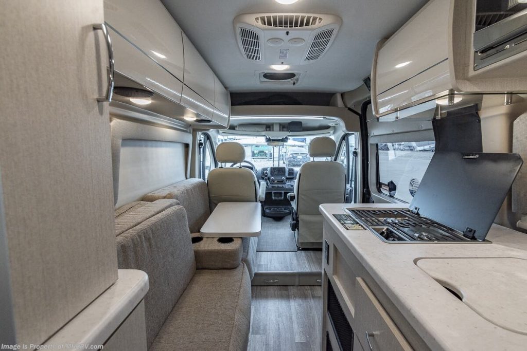 inside kitchen and lounge area of a 2024 Thor Motor Coach Rize
