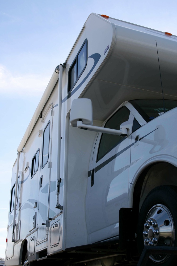 up close side view of a class c motorhome