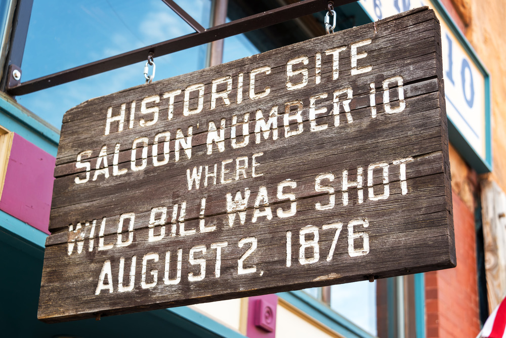 Sign marking the location where Wild Bill Hickok was shot in Deadwood, South Dakota