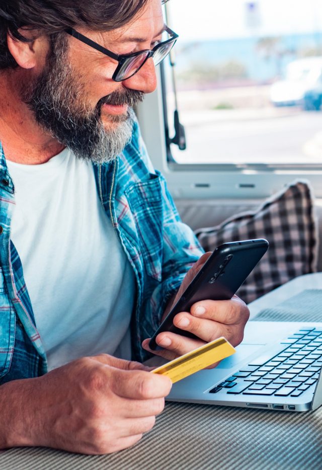 Full time RVer buying RV insurance on line using laptop