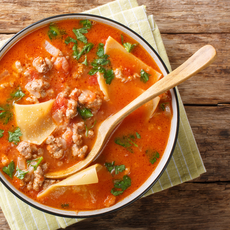 Portion of rich one pot lasagna soup close-up in a bowl