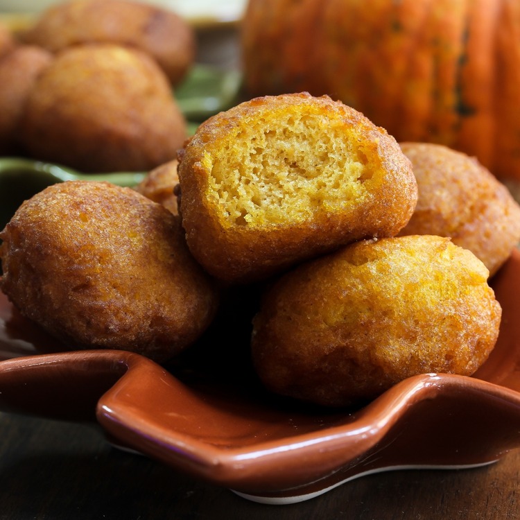 picture of a half eaten homemade pumpkin donut hole