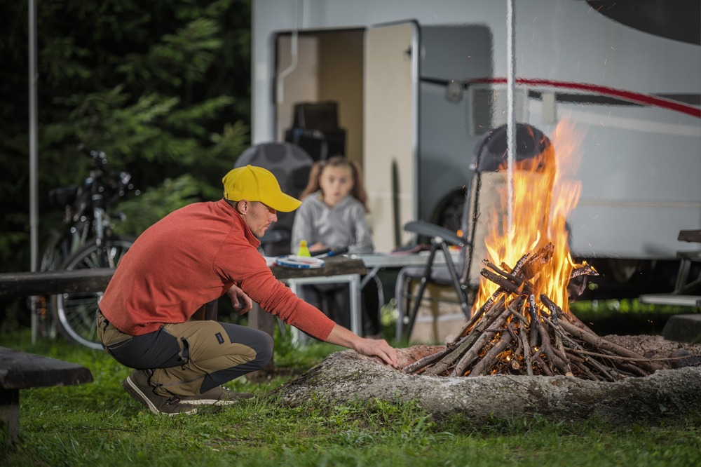A father setting up camp using RV boondocking tips