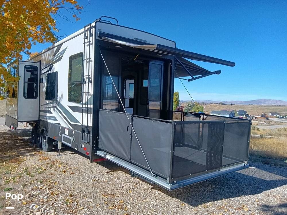 keystone Raptor fifth wheel toy hauler rear fenced in patio on a keystone toy hauler
