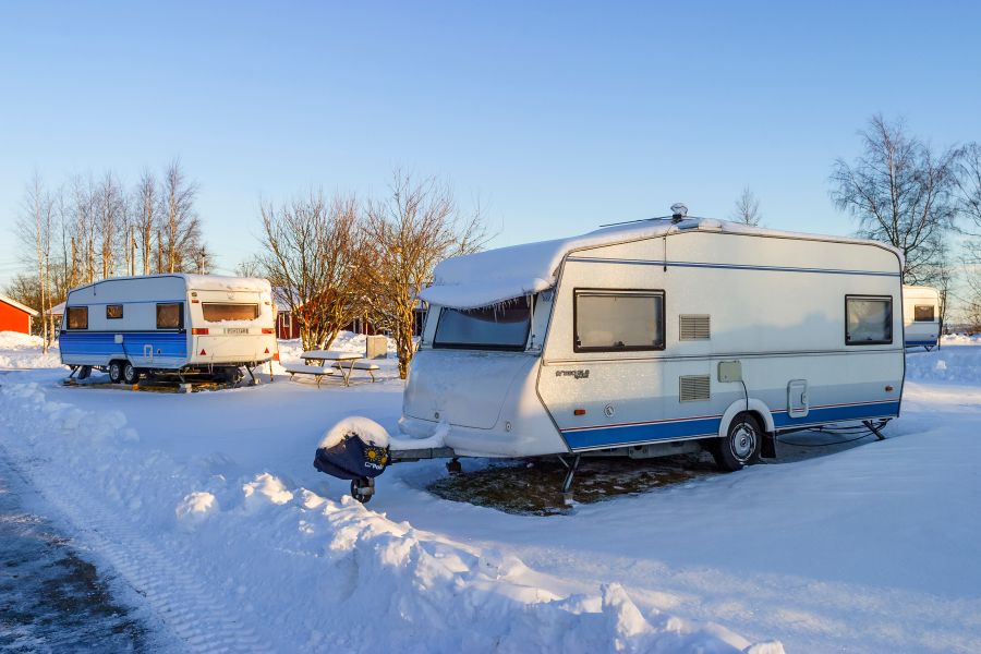 Travel Trailer at a snowy campsite