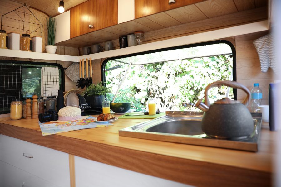 rv kitchen interior with different accessories and utensils