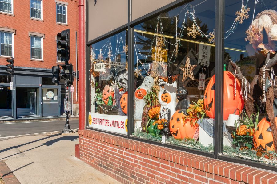 Streets of salem during halloween, a shop window filled with jack o laterns