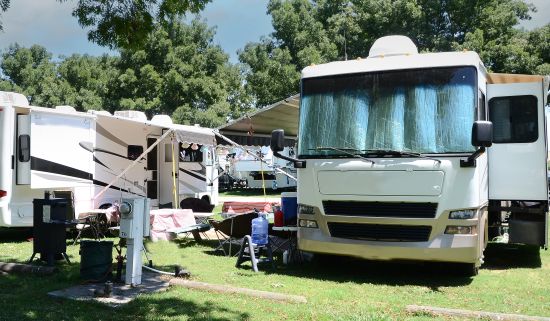 Camping door to door in a motorhome with front and backside of Rv's showing